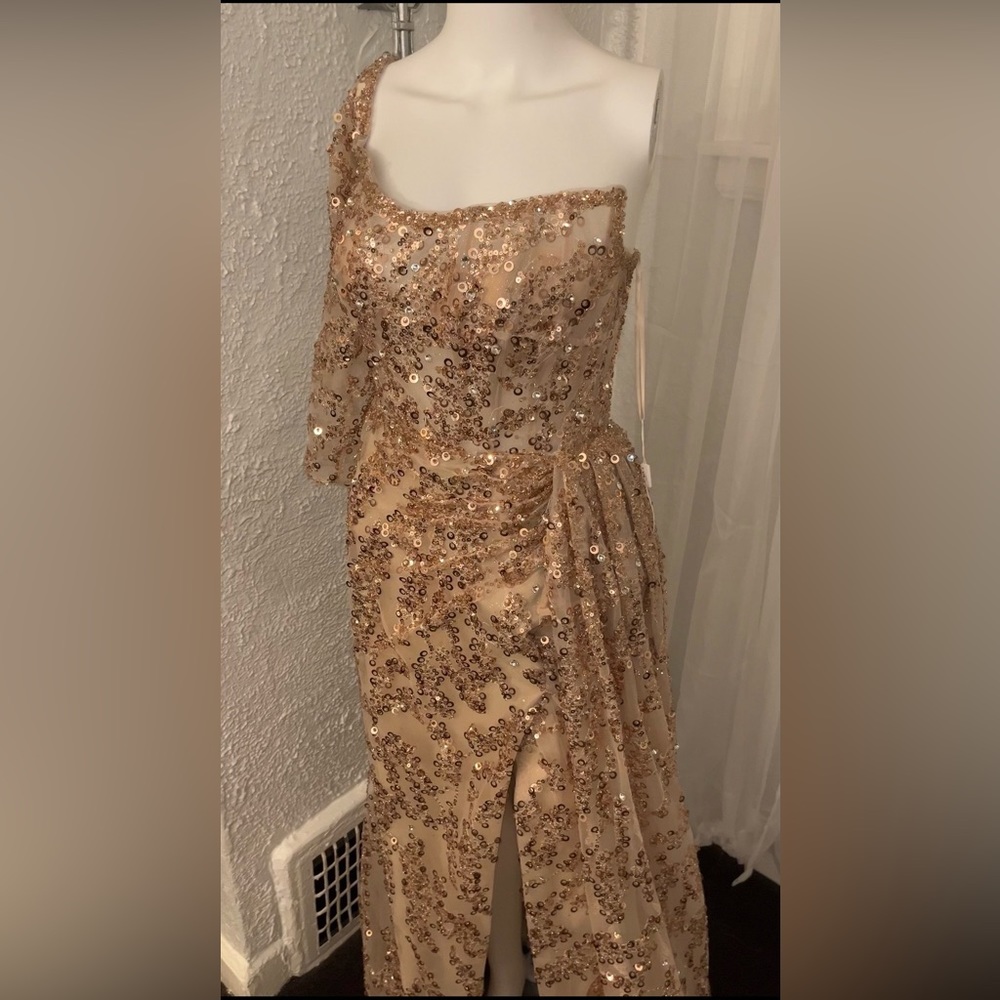 Front slit,maxi dress,one long sleeve worn once for a a couple hours